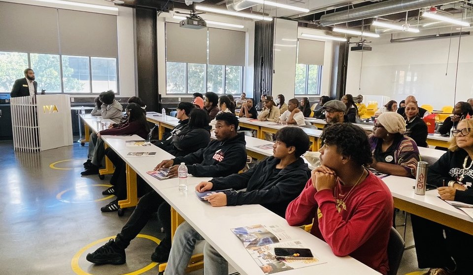 Residents, students and partners at a CRSSLA community session