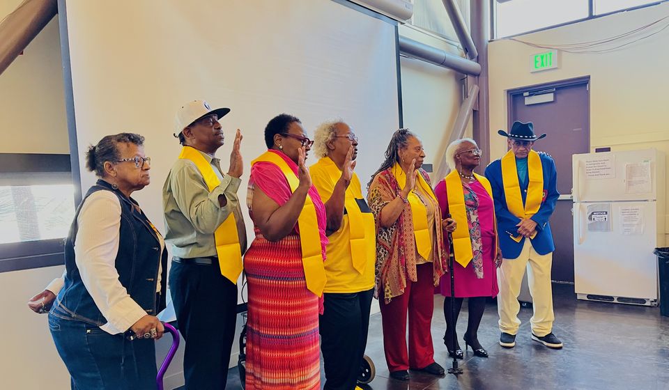 Seniors in gold stoles at a CRSSLA gathering